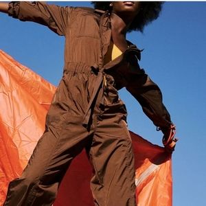 Free people one piece wind breaker outfit.